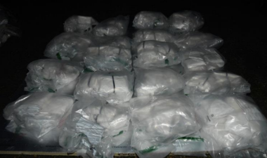 Numerous bags of drugs piled up